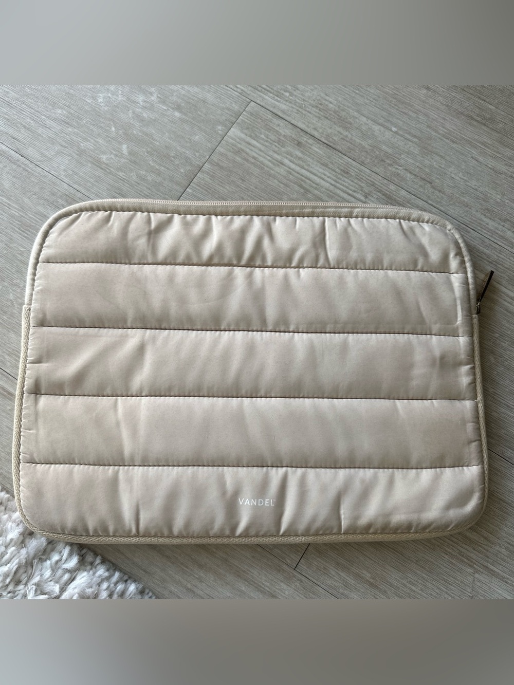Cream laptop sleeve